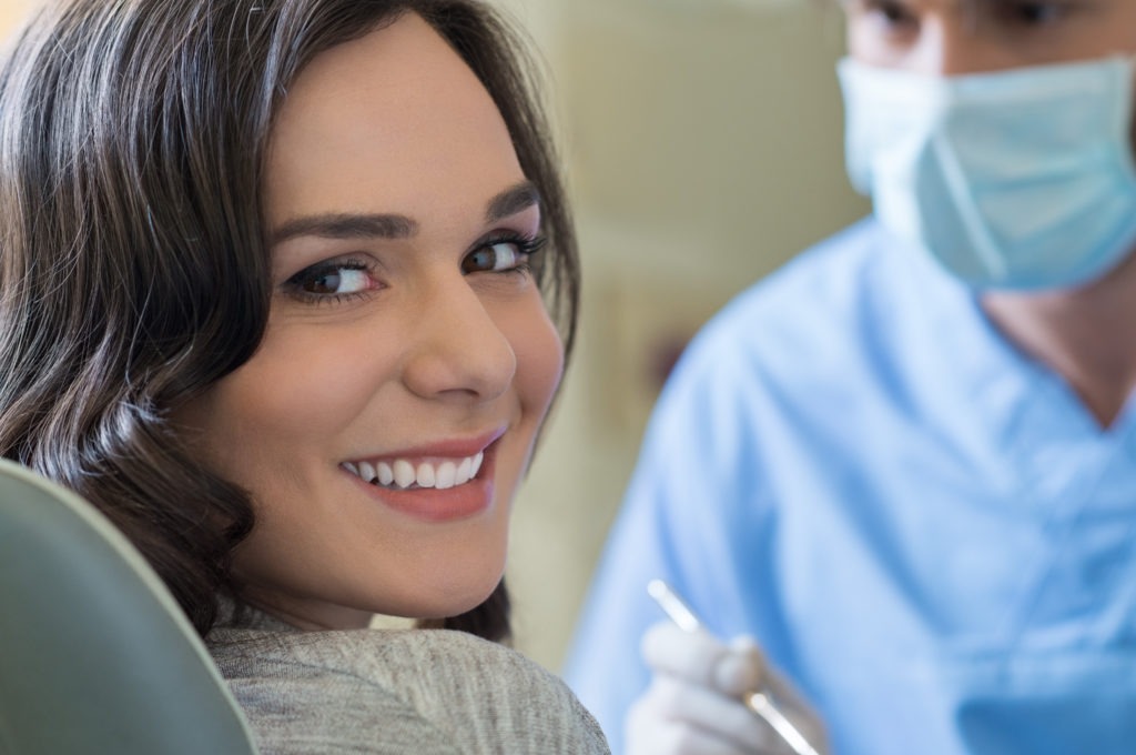 Young woman in dental chair