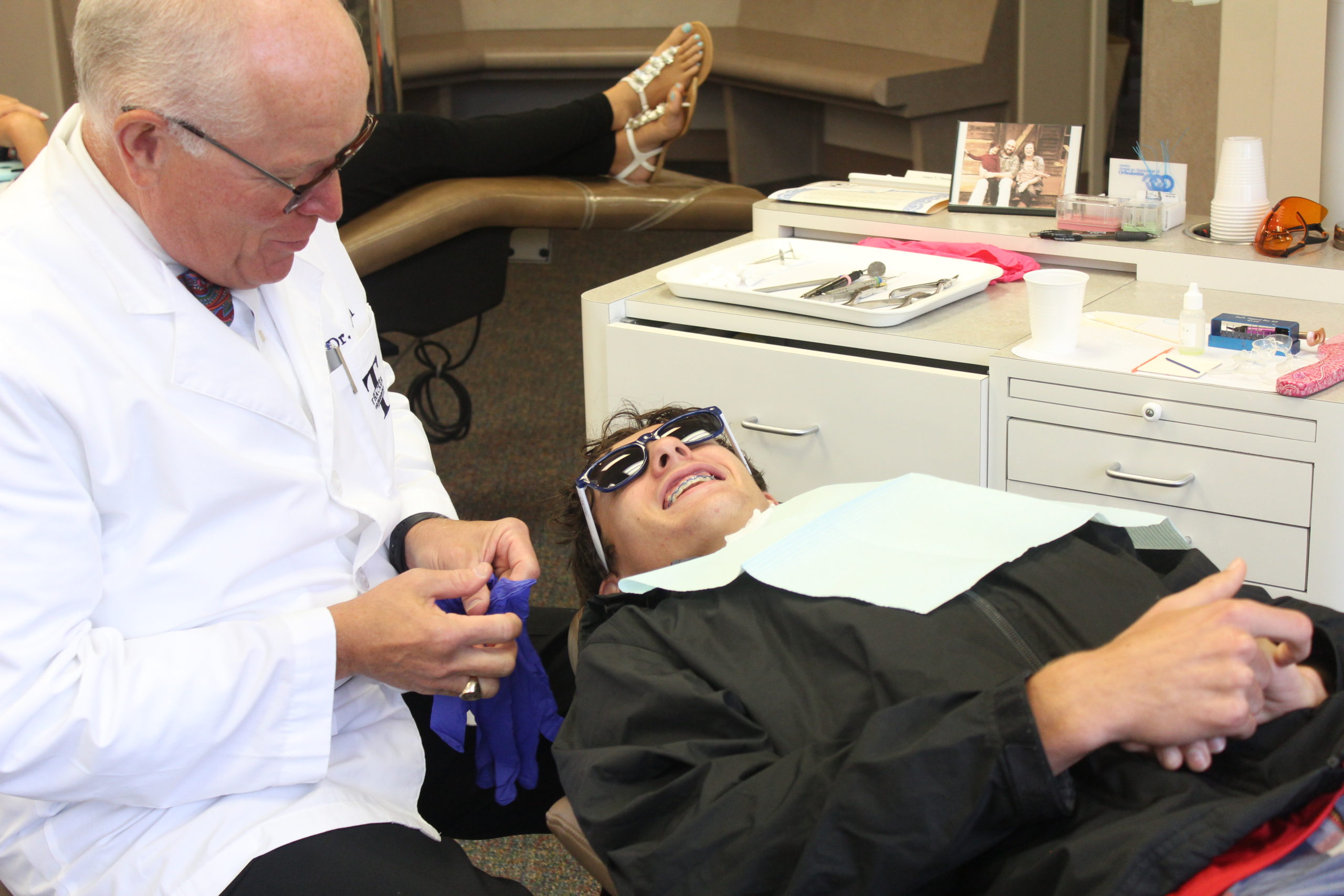 Dr. Thacker with a patient