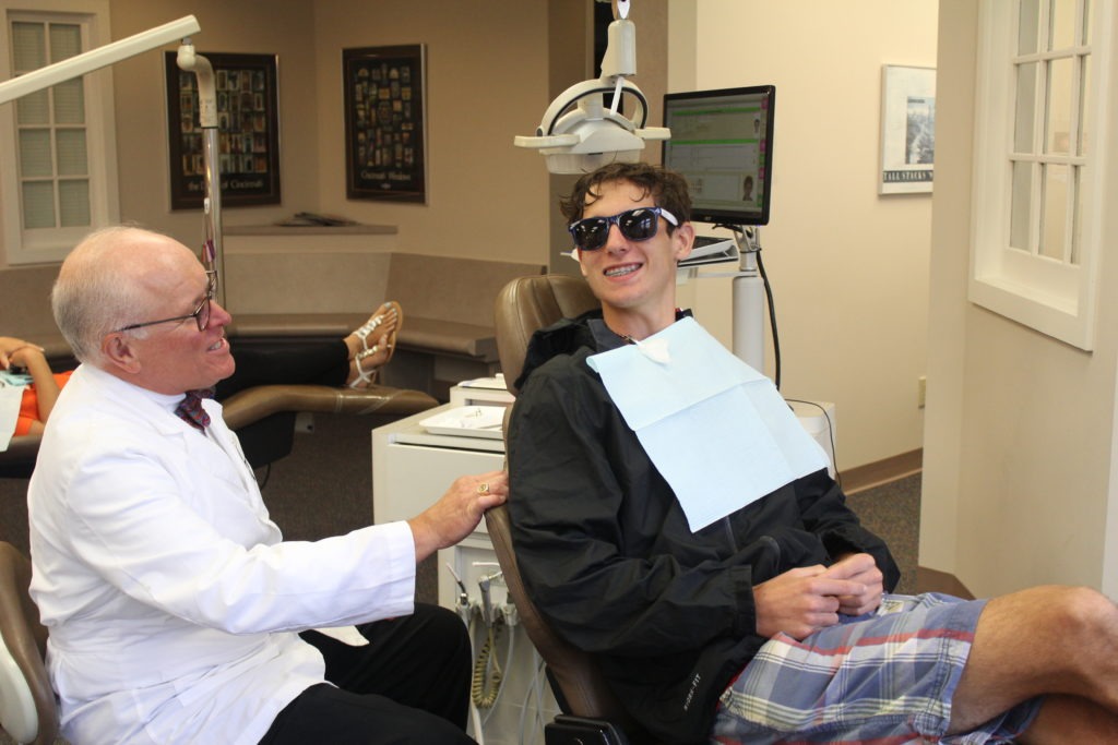 Dr. Thacker working with a patient