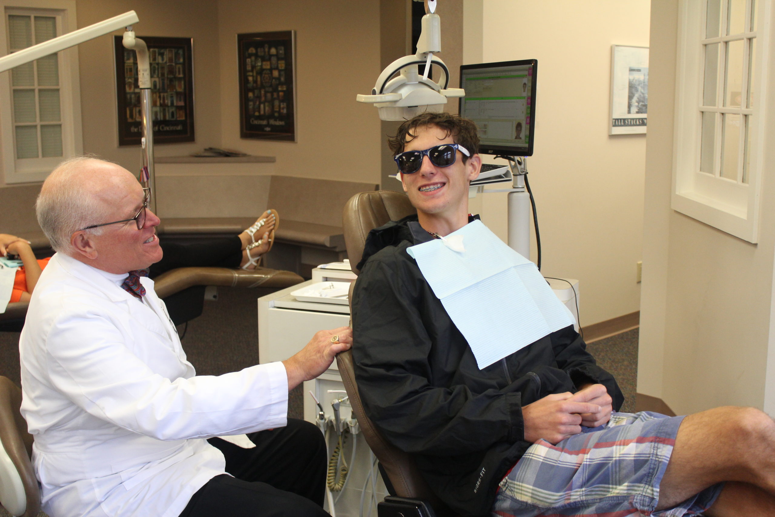 Dr. Thacker working with a patient