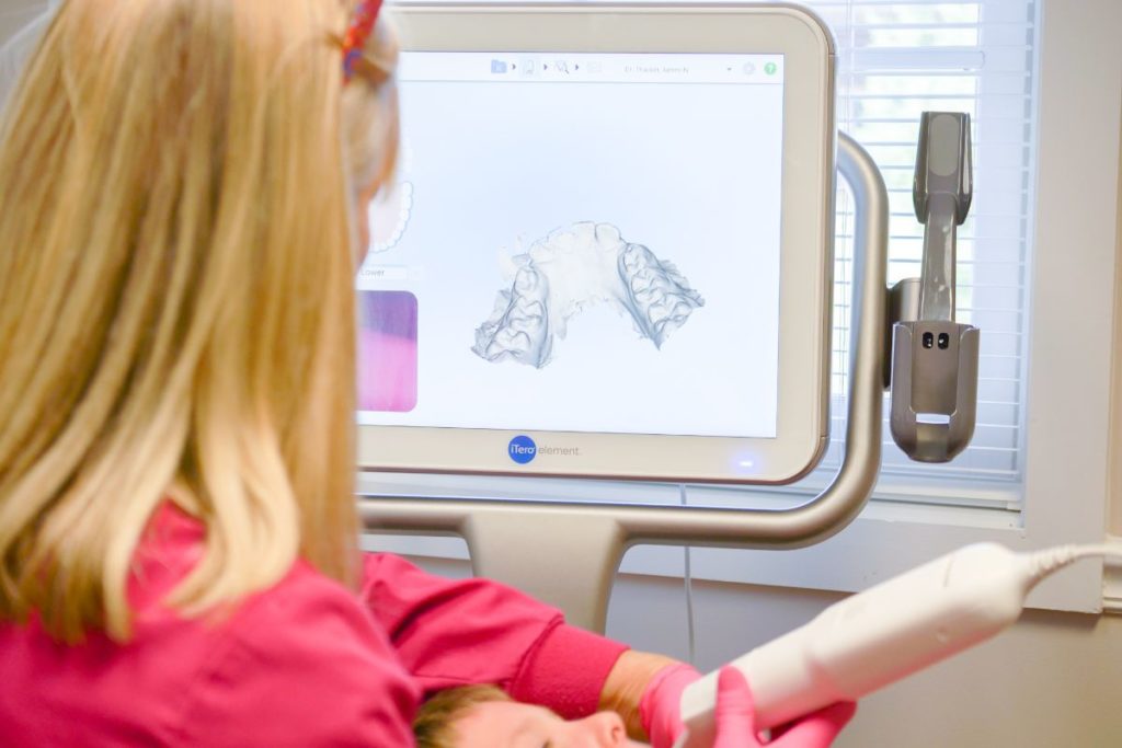 Survival Guide: Invisalign Assistant making dental scans