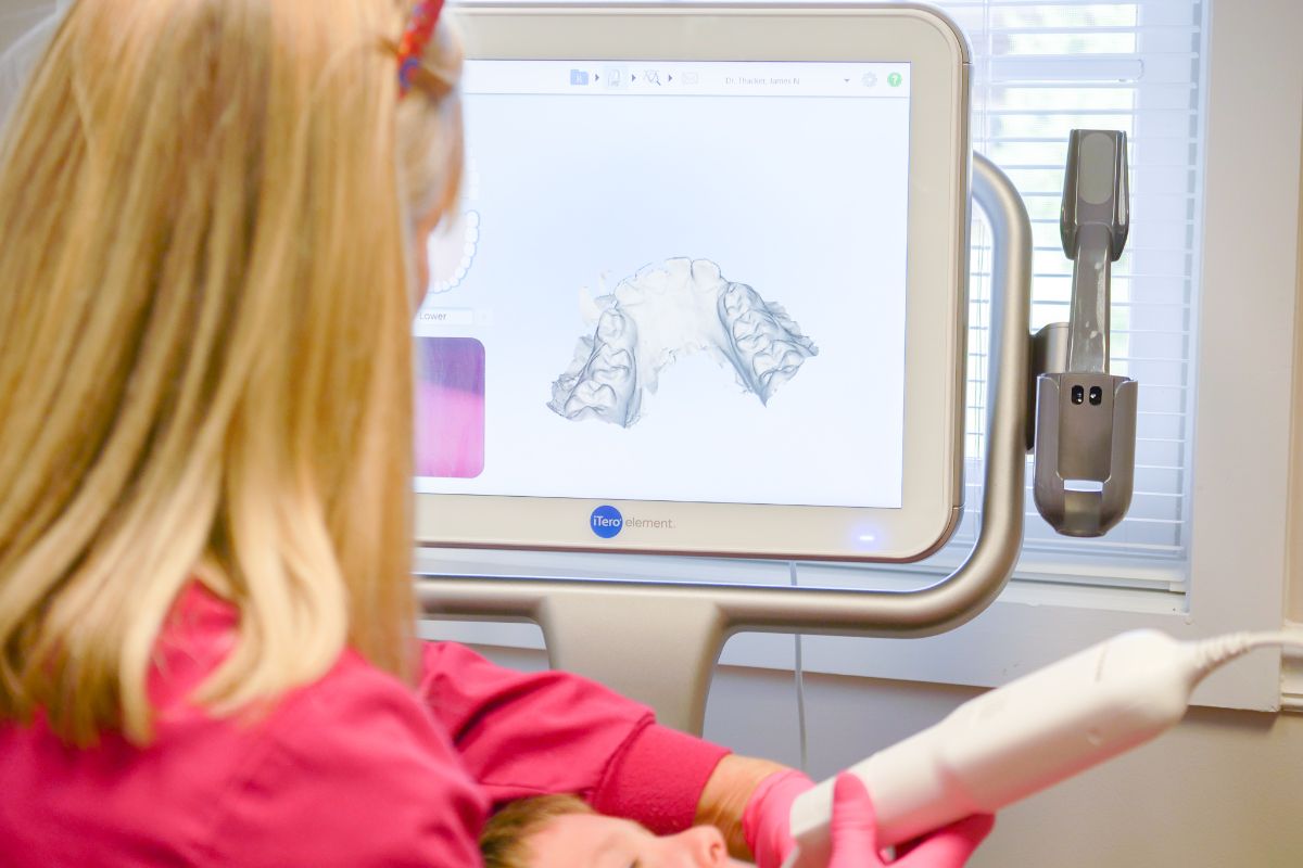 Survival Guide: Invisalign Assistant making dental scans